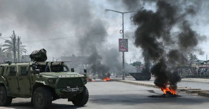 Post-election protests rage in Mozambique, buildings torched