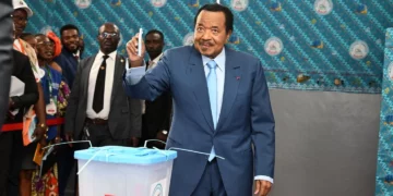 Paul Biya casts his ballot during Cameroon’s presidential election, which secured him an eighth term in office