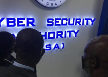 Officials view illuminated signage at the Cyber Security Authority headquarters in Accra, Ghana.