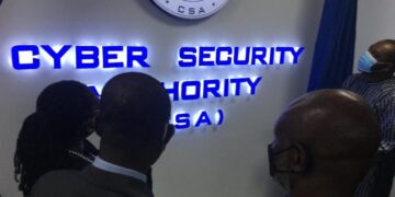 Officials view illuminated signage at the Cyber Security Authority headquarters in Accra, Ghana.