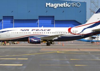 Air Peace aircraft parked on the tarmac at night ahead of the airline’s inaugural Lagos-to-Barbados flight service
