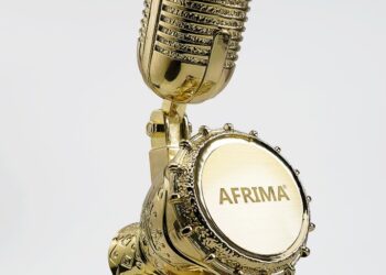 Golden AFRIMA trophy featuring a microphone and African drum design symbolising the continent’s musical excellence.
