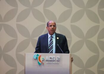 African Union Commission Chairperson Mahmoud Ali Youssouf speaking at a press conference.