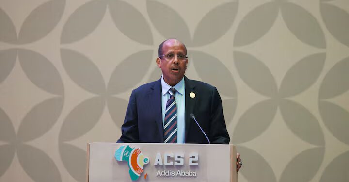 African Union Commission Chairperson Mahmoud Ali Youssouf speaking at a press conference.