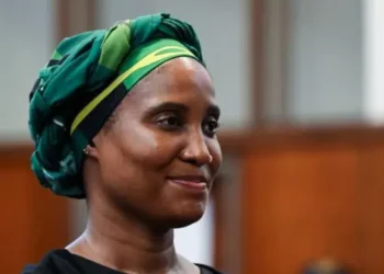 South African politician Duduzile Zuma-Sambudla wearing a green headwrap during a public appearance