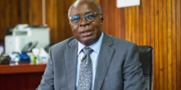 Finance Minister Situmbeko Musokotwane speaking at a government event in Zambia, addressing economic recovery and debt restructuring progress