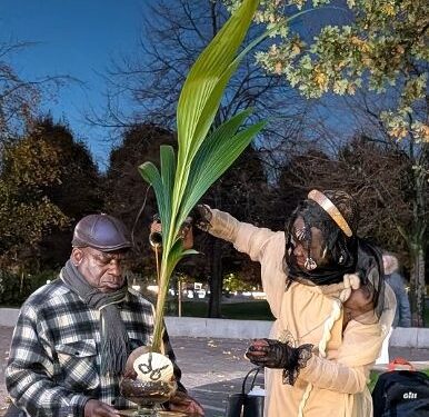 The Crude Madonna performs a ritual libation with Simeon Kpoturu of the Movement for the Survival of the Ogoni People (Mosop) during a vigil outside Shell’s London headquarters marking the 30th anniversary of the Ogoni Nine executions.