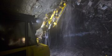Underground mining machine drilling into rock at a Zambian copper operation