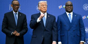 Donald Trump stands with Rwanda’s President Paul Kagame and Congo’s President Felix Tshisekedi during a US-brokered peace deal signing in Washington