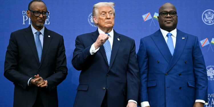 Donald Trump stands with Rwanda’s President Paul Kagame and Congo’s President Felix Tshisekedi during a US-brokered peace deal signing in Washington