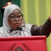 Tanzania’s President Samia Suluhu Hassan speaking at a podium and pointing during a public address in Dar es Salaam