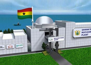 Ghana’s proposed first nuclear power plant shown in an architectural rendering with the national flag, illustrating plans for nuclear energy development