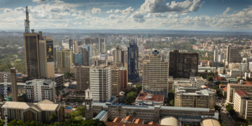 A view of Nairobi’s central business district with office towers and city traffic on a clear day.