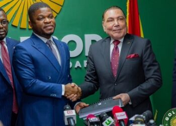 GoldBod CEO Sammy Gyamfi shakes hands with Gold Coast Refinery executives during the signing of Ghana’s gold refining agreement in Accra.
