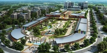 Aerial rendering of Kigali Innovation City showing modern research buildings, green spaces and a central public plaza in Rwanda