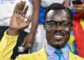 Congolese football supporter raises his hand in a Patrice Lumumba tribute pose during an AFCON match in Morocco