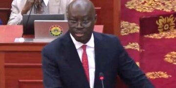 Ghana’s finance minister addressing parliament during presentation of the 2025 national budget focused on economic recovery and fiscal stability