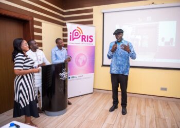 Speaker presenting during an iPRIS ICT policy and regulation training workshop with participants at a digital inclusion capacity-building session in West Africa