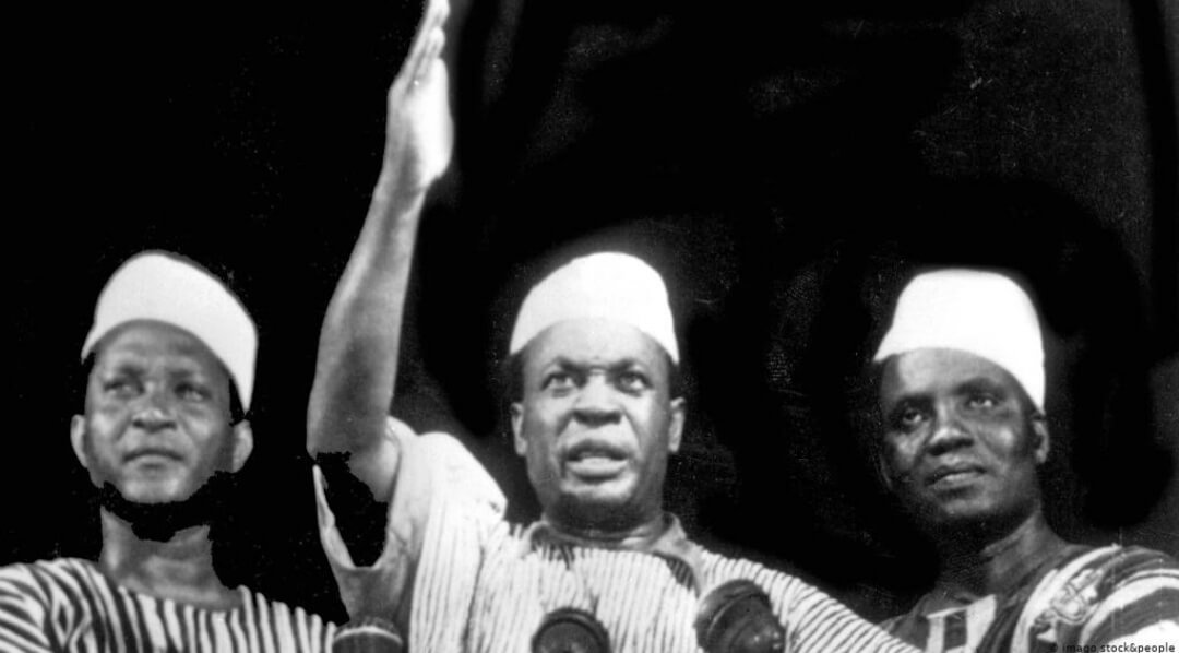 Kwame Nkrumah addressing supporters during Ghana’s independence era alongside nationalist leaders.