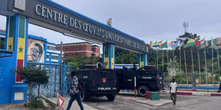Police vehicles stationed at the entrance of Cheikh Anta Diop University (UCAD) in Dakar following deadly student protests