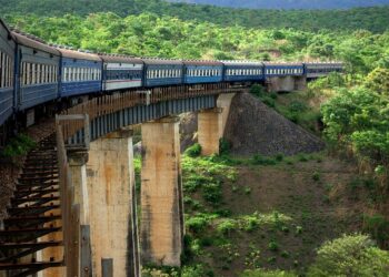 TAZARA passenger train crossing bridge between Tanzania and Zambia after cross-border service restart