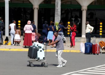 Travellers arrive at Jomo Kenyatta International Airport in Nairobi as an aviation workers’ strike causes flight delays and disruption.