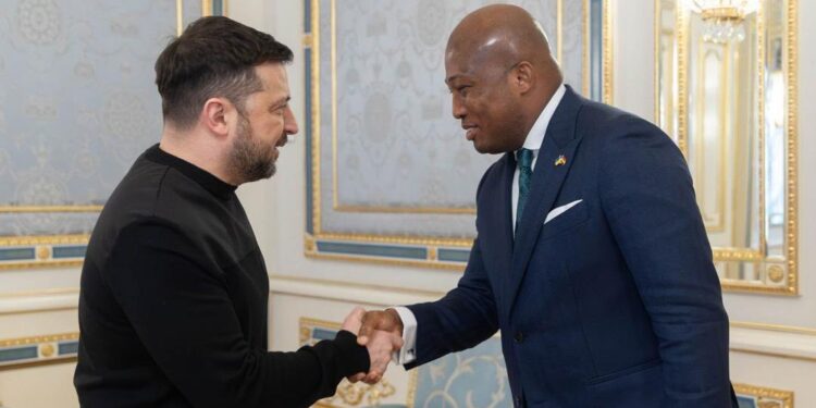 Ghana’s Foreign Minister Samuel Okudzeto Ablakwa shakes hands with Ukrainian President Volodymyr Zelenskyy during diplomatic talks in Kyiv focused on detained Ghanaian citizens and bilateral cooperation