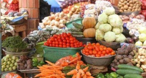 Fresh vegetables and staple food products displayed at a local market in Gabon amid government measures to reduce food prices