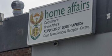 South Africa Department of Home Affairs office sign in Cape Town linked to visa corruption investigation
