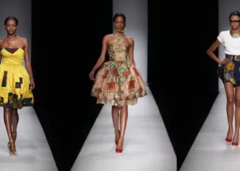 Models showcase contemporary ‘Made in Ghana’ fashion designs on a runway, highlighting modern African textiles and tailoring craftsmanship