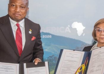 Ghana Foreign Minister Samuel Okudzeto Ablakwa and Colombian Foreign Minister Rosa Yolanda Villavicencio display the signed Tema–Cartagena port link agreement in Bogotá
