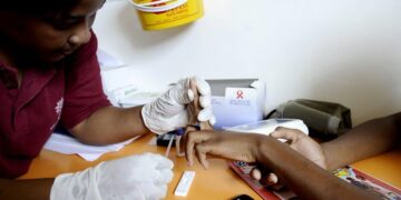 Healthcare worker administering HIV prevention injection during clinic visit in Eswatini