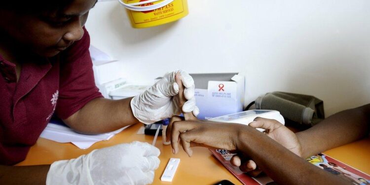Healthcare worker administering HIV prevention injection during clinic visit in Eswatini