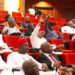 Nigerian lawmakers voting during a plenary session in the National Assembly in Abuja