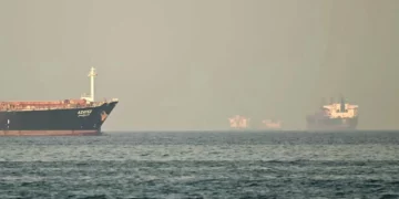 Oil tankers sailing through the Strait of Hormuz amid Iran crisis raising global energy supply concerns