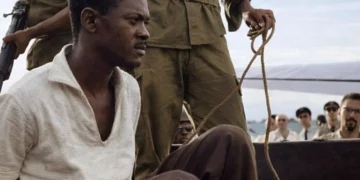 Patrice Lumumba restrained by soldiers before his execution in Katanga in 1961, a defining moment in DR Congo’s post-independence crisis