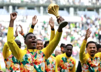 Senegal players celebrate with AFCON trophy amid dispute
