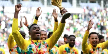 Senegal players celebrate with AFCON trophy amid dispute