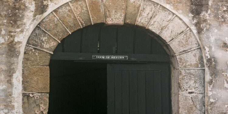 Door of Return at Cape Coast Castle in Ghana, historic slave trade site linked to transatlantic slavery reparations debate