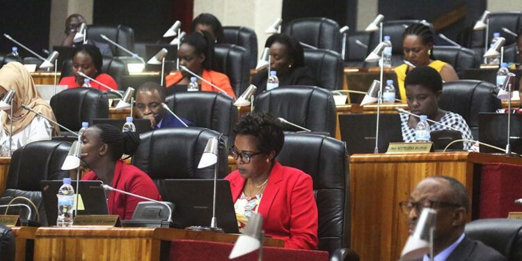 Women members of parliament seated during legislative session in African parliament, highlighting female political representation and governance