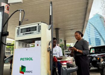 African fuel station displaying rising petrol prices amid global oil surge linked to Middle East conflict