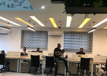 African tech professionals working in a modern office in Lagos, showcasing digital skills, collaboration, and the future of work in Africa