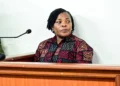 Agnes Nandutu speaks at a microphone during a public appearance in Uganda