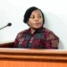 Agnes Nandutu speaks at a microphone during a public appearance in Uganda