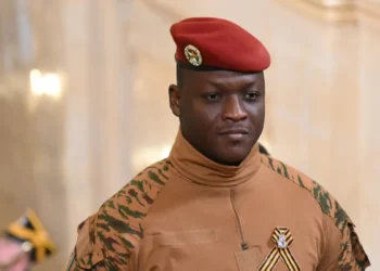 Burkina Faso military leader Captain Ibrahim Traore in uniform with red beret during official appearance