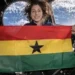 Christina Koch holds Ghana flag inside spacecraft during Artemis II mission beyond Earth orbit
