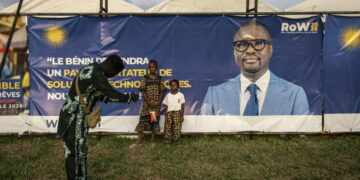 Benin election campaign setting with tents and banner, as finance minister Romuald Wadagni emerges as frontrunner to succeed President Patrice Talon