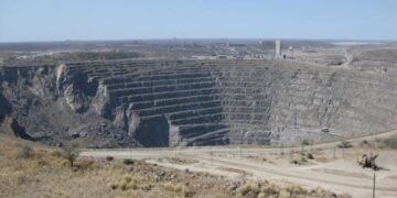 Open-pit mine in Phalaborwa, Limpopo, South Africa showing large-scale excavation linked to rare earth minerals project