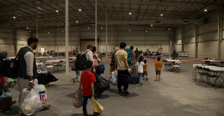 Afghan evacuees wait at Camp As Sayliyah in Qatar during stalled US visa processing