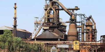 Ajaokuta Steel Company plant in Nigeria showing rusted blast furnace structures and idle industrial equipment